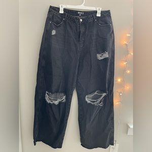 Black, distressed, wide-leg jeans.